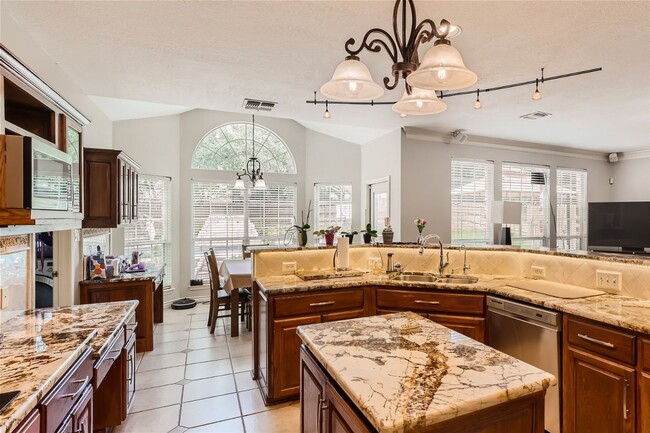 Building Photo - Stunning Home in Guard Gated Community ~ I...