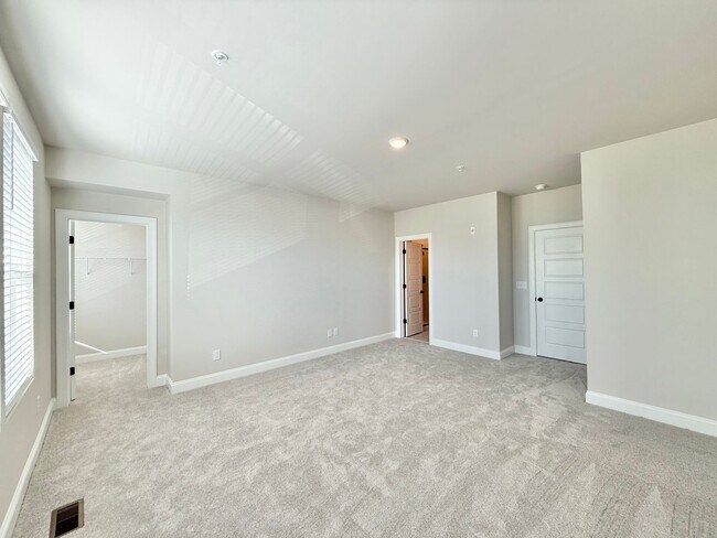 Building Photo - Stunning New Construction 2BD, 2.5BA Cary Townhome-Style Condo with a 1-Car Garage & Bonus Flex S...