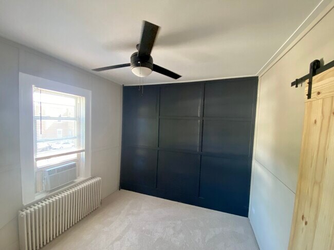 Bedroom with Accent Wall - 119 W State St