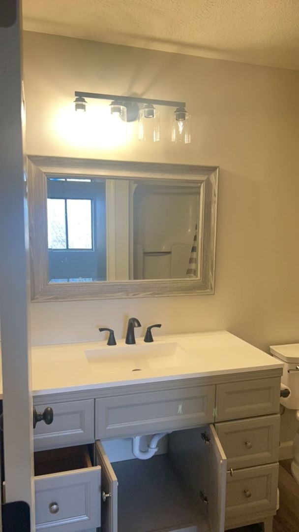 Building Photo - Fun and Stylish Living at Madison Manor! Top-Floor Condo with Vaulted Ceilings and Skylights