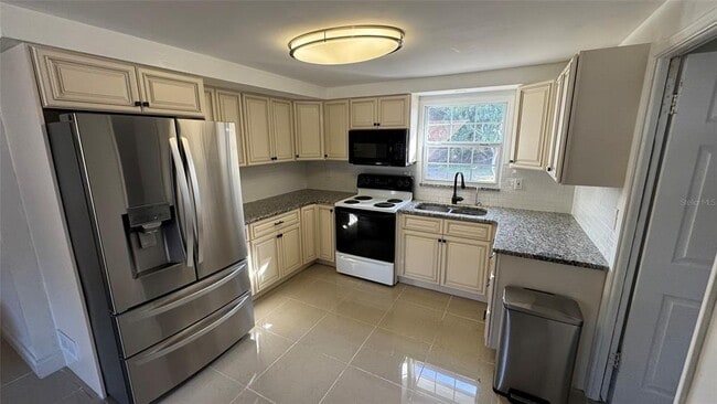 Building Photo - 6980 82nd Ave N