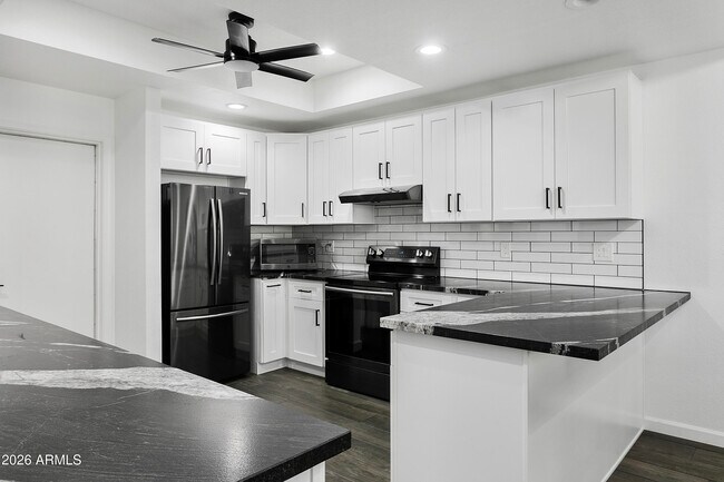 Building Photo - 1610 N Stapley Dr