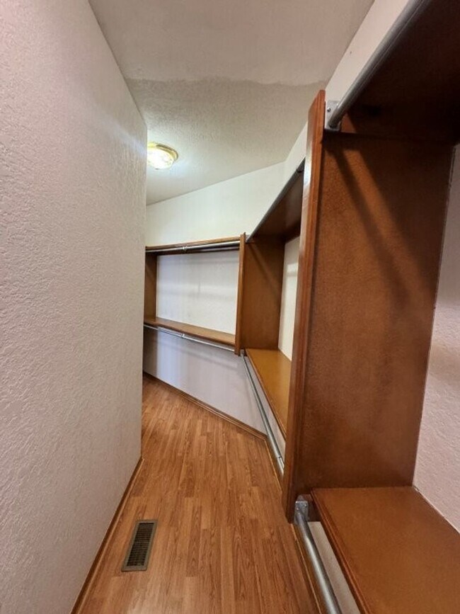 Building Photo - 4-bedroom 2 bath home in Kingsbrook, lots of storage, 2 dining areas and stand-up storm shelter! ...