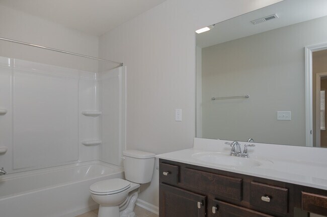 Building Photo - Gorgeous End-Unit Townhome with Spacious Layout!