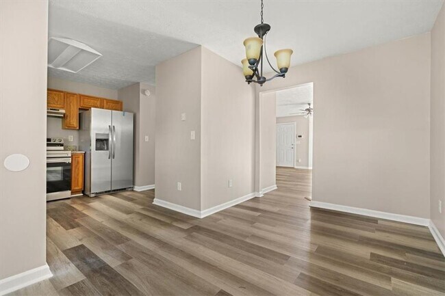 Building Photo - 5696 Windfall Ln