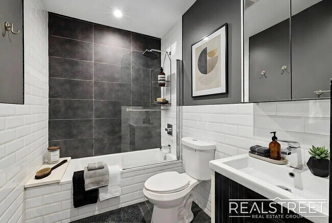 Building Photo - Modern Bushwick 2-bedroom, 2.5-bath duplex with private garden, deck, and finished recreation room —