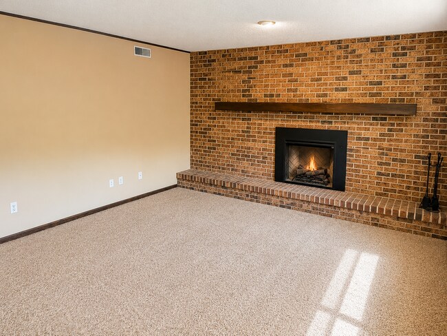 Building Photo - Spacious West Manhattan Home with Modern Updates, Oversized Garage & Prime Location