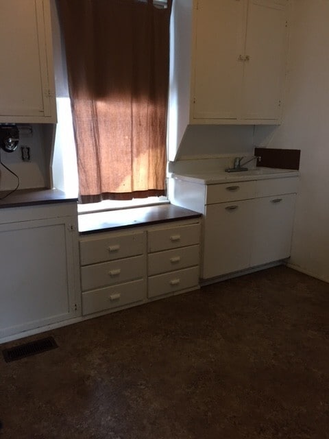 Building Photo - Corner lot with fenced yard!