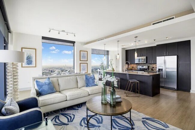 Building Photo - Skyline Views + Luxury Living | Up to 4 We...