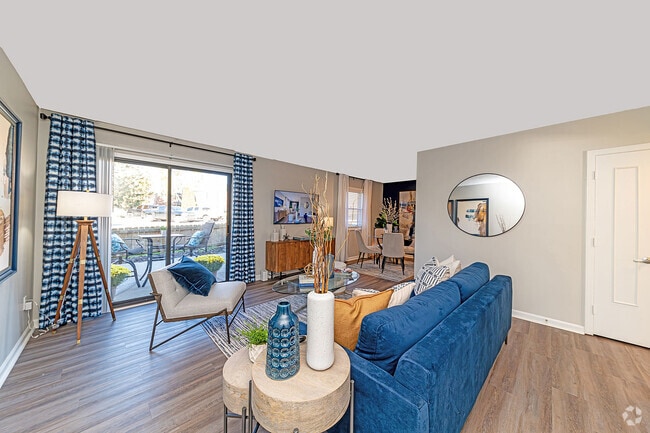 Spacious living room with hardwood-style flooring