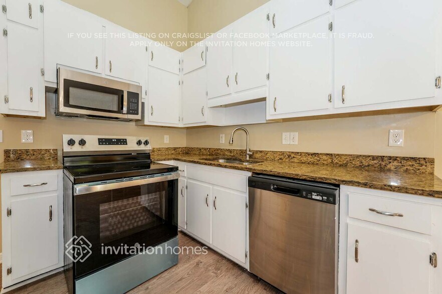 Building Photo - 6514 Woodthrush Way