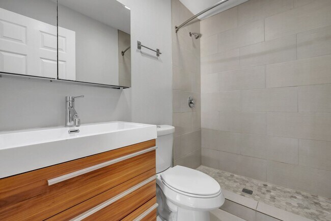 Building Photo - Modern Comfort Meets Prime Location — Styl...
