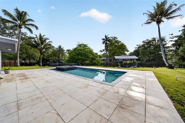 Building Photo - 11665 W Biscayne Canal Rd