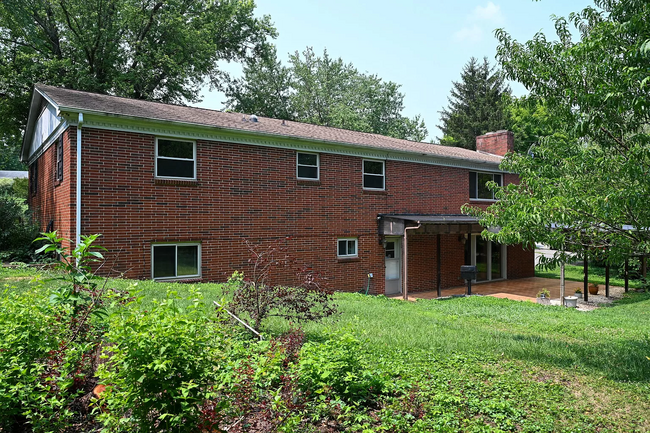 Rear View of the House and Yard - 200 Suburban Rd