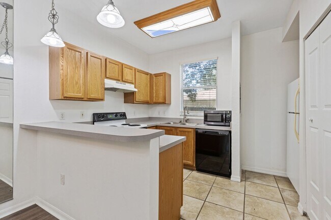 Building Photo - Just Reduced!! Close to UF Two Story Townhouse