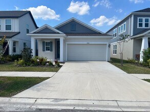 Building Photo - Beautiful home located in desirable Waters...