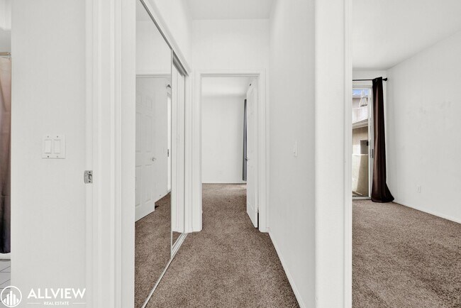 Building Photo - Spacious Coastal Condo with Rooftop Ocean ...