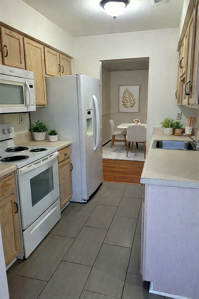 Building Photo - Spacious 3BR Townhome • $2,150 • Fenced Yard + Bonus Room • Prime Location