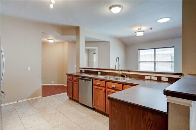 Building Photo - Charming One-Level 4 Bedroom Home with 2-C...