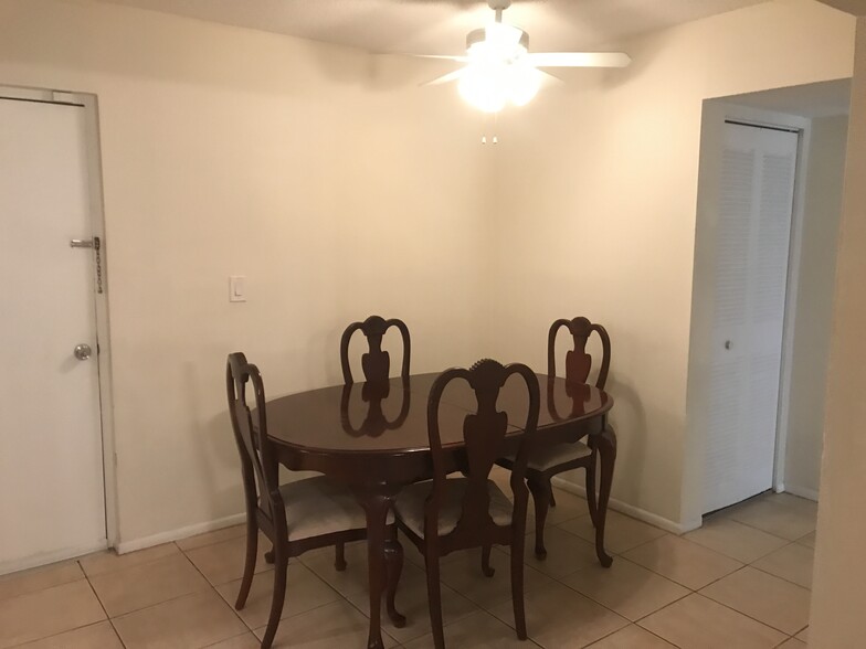 Dining room table and chairs - 480 NW 20th St