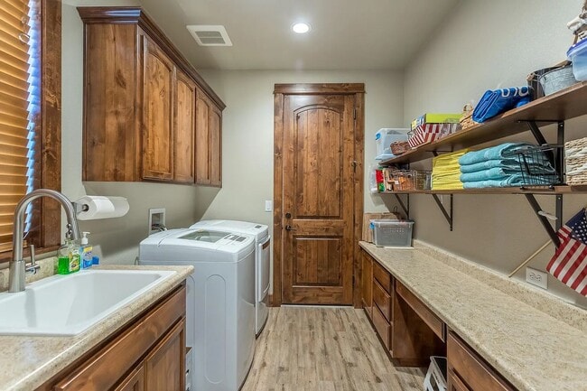 Building Photo - Custom Home with Solar, a Pool & all the Upgrades...in Town...Must See!