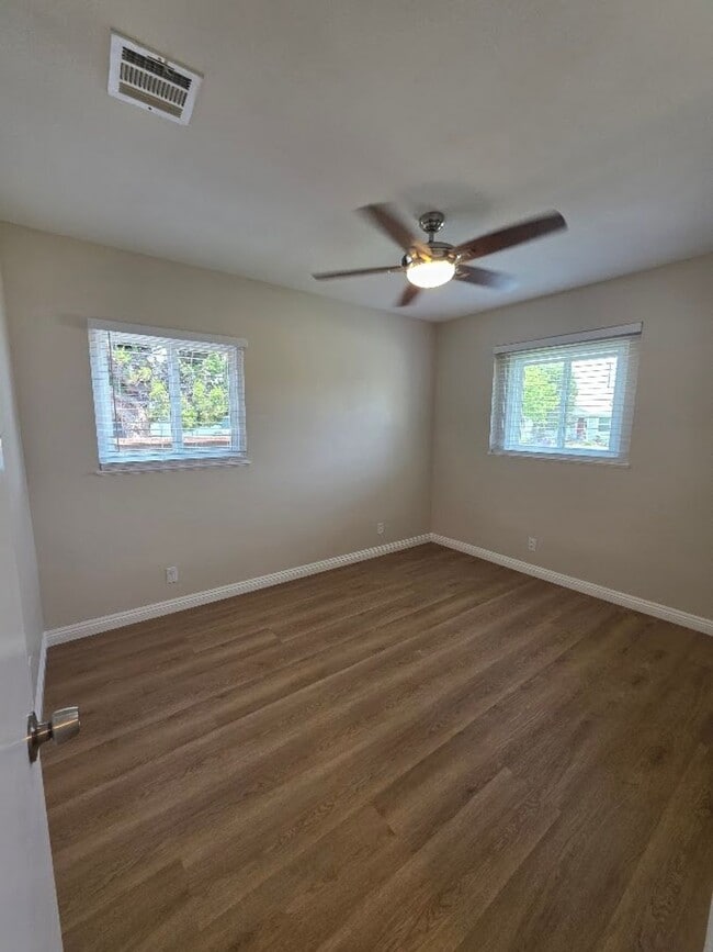 Building Photo - TURNKEY-RENT READY SPACIOUS 2BD/2BA HOME, 2-CAR GARAGE WITH AN AUTOMATIC ROLL-UP DOOR, LARGE COVE...