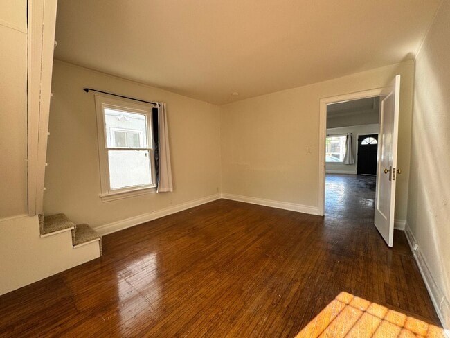 Building Photo - Two Bedroom Front House near Westside Village