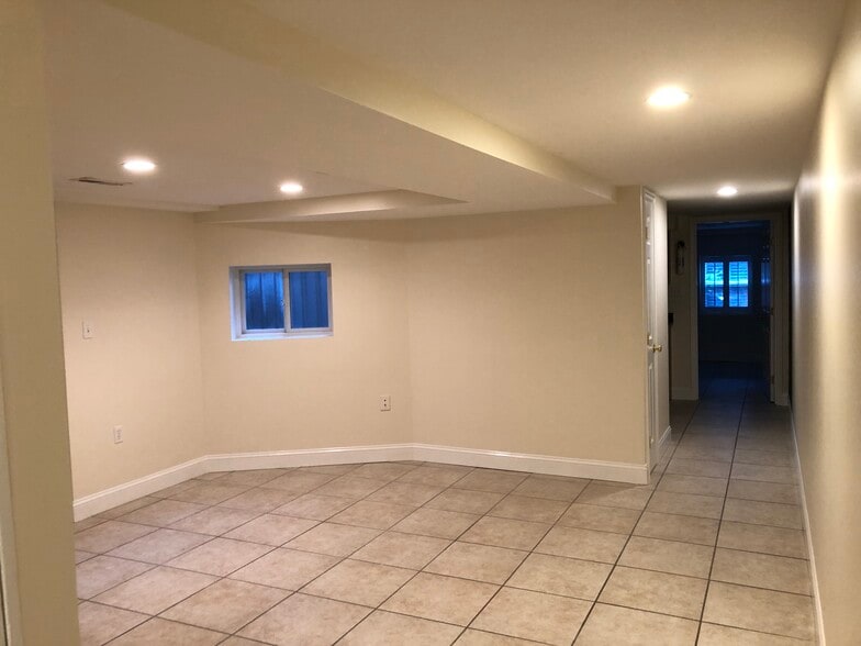 Large living room with second exit - 1859 Mintwood Pl NW