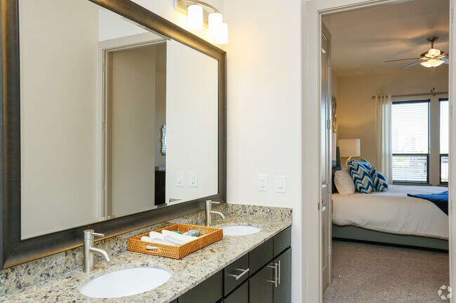 Building Photo - Making Midtown Buzz — Live in Style Today!