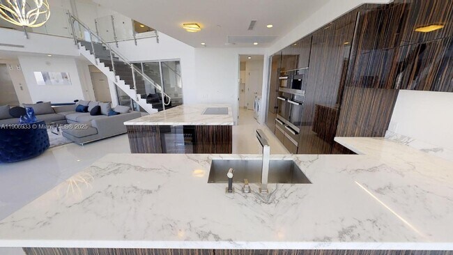 Building Photo - 18555 Collins Ave