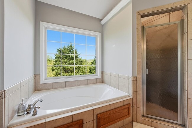 Building Photo - Stunning 4BR Home in Cascade Falls – Modern Upgrades & EV Ready!