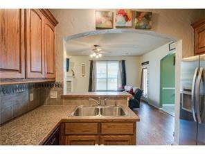 Building Photo - Former model home on corner lot is ready for move in!