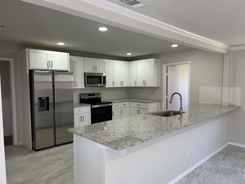 View into Kitchen from Dining Room - 3404 Martin Lydon Ave