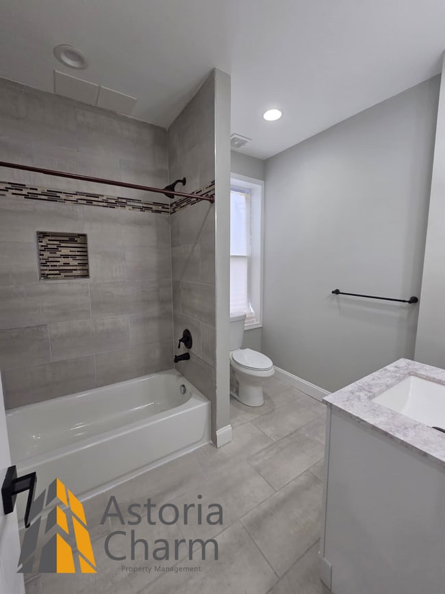 Building Photo - 4 Bedroom Rowhome with Loft Style Primary Suite and Finished Basement