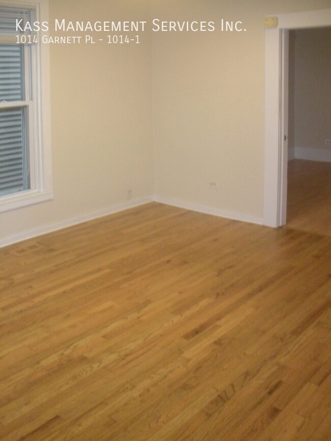 Building Photo - Very Spacious Duplex Apartment features 4 ...