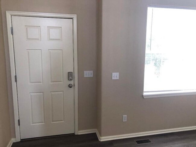 Building Photo - Fully Renovated, "MUST SEE" 3 Bedroom, 3 Bath Townhome with 2 Car Attached Garage