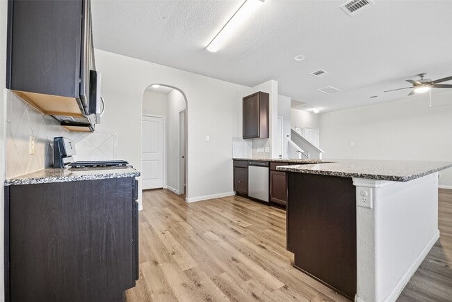 Building Photo - 4818 Blue Jacaranda Wy