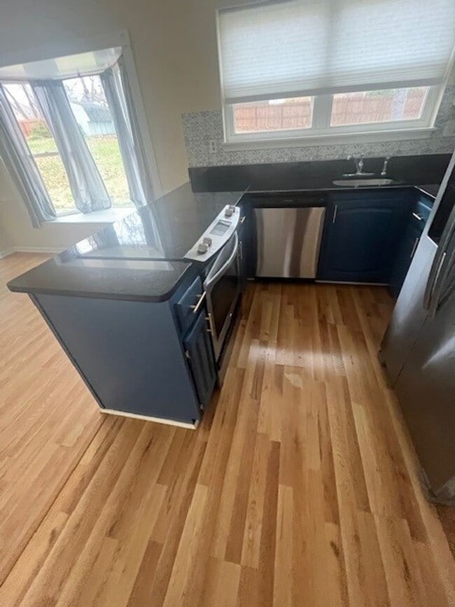 Building Photo - LOVELY CAPE COD WITH 4 BEDS, 2 BATHS AND GARAGE