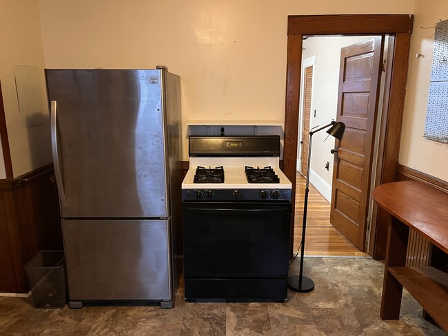 Kitchen and door to Bedroom 1 - 19 Fairmont St