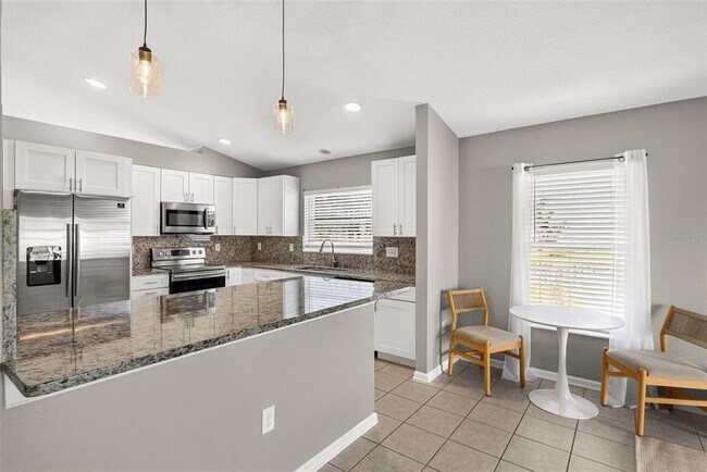 Building Photo - 7619 Crescent Palm Dr