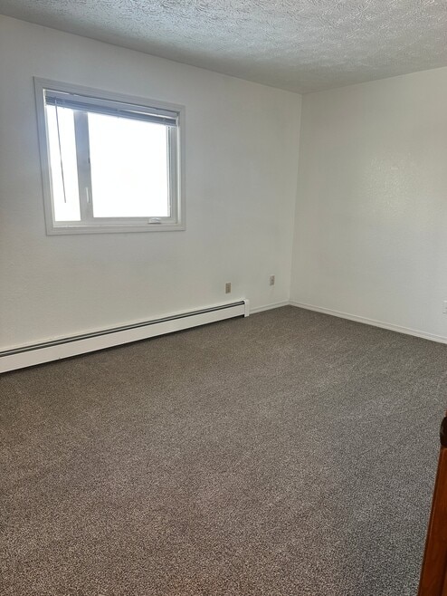 Building Photo - 2301 E 68th Ave