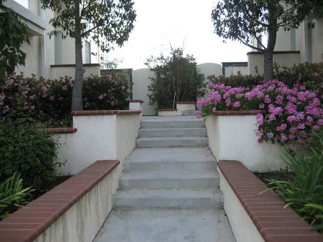 main entrance and back yard entrance - 4489 Spencer St