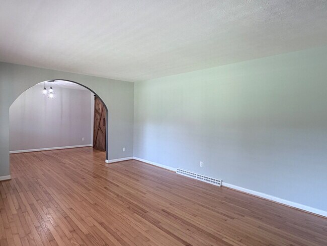Building Photo - Updated 3BR Home in Beaver Lake | Fenced Yard, Garage, Covered Porch & Outdoor Fireplace | Pet Fr...