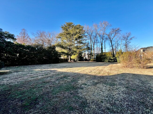 Building Photo - Lovely mid-century brick ranch on a beauti...