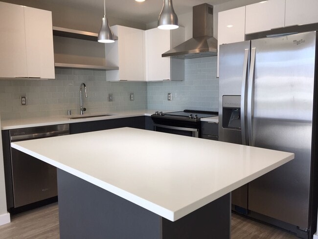 Building Photo - Rare Living Opening at Talbach Condominiums