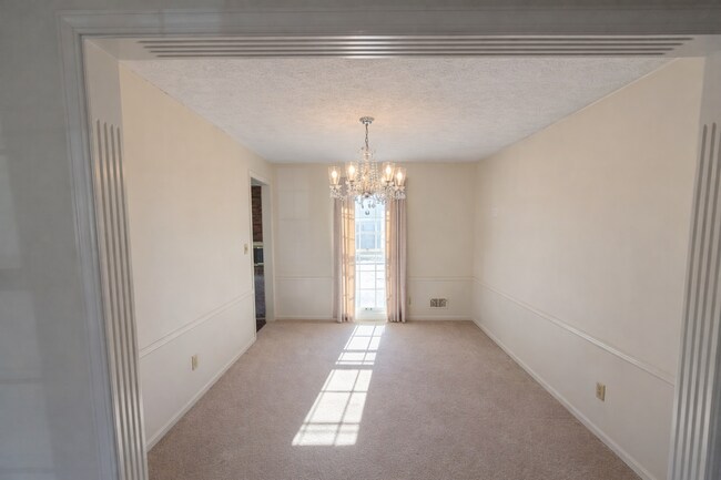 Building Photo - SPACIOUS 3 Bedroom, 2 bathroom home with basement and garage