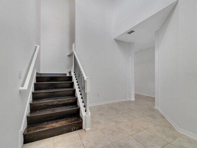 Building Photo - 7323 Pool Compass Loop