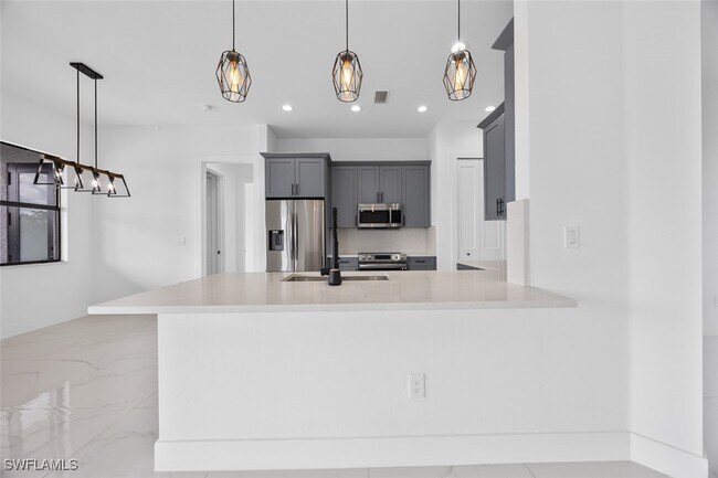 Building Photo - 1609 Nelson Rd N