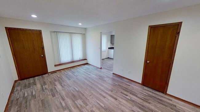 Building Photo - Updated 2BR/1BA duplex with office in partially finished basement, detached garage and across fro...