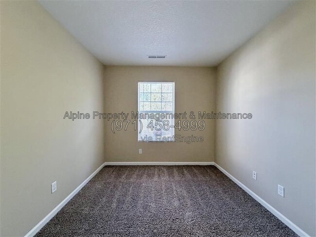 Building Photo - 5758 NE Damsel Dr